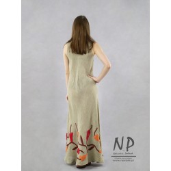 Artystyczna lniana sukienka z naszytymi sukienkami, uszyta ze skosu.