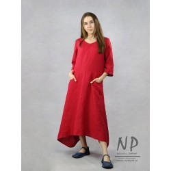Red maxi linen dress with a sleeve by the elbow, pockets and an asymmetrical cut
