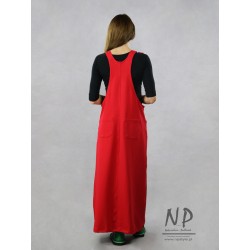 Long red gardener dress decorated with hand-painted houses
