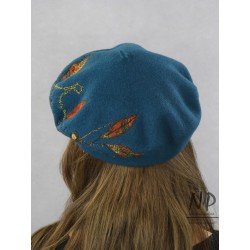 Wool women's beret decorated with hand-felted and embroidered applications