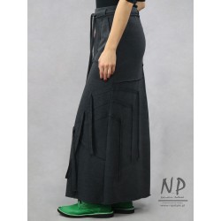 Long, knitted gray narrow skirt decorated with sewn-on stripes