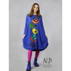 A short, hand-painted, knitted oversize dress, made in the style of a baubles