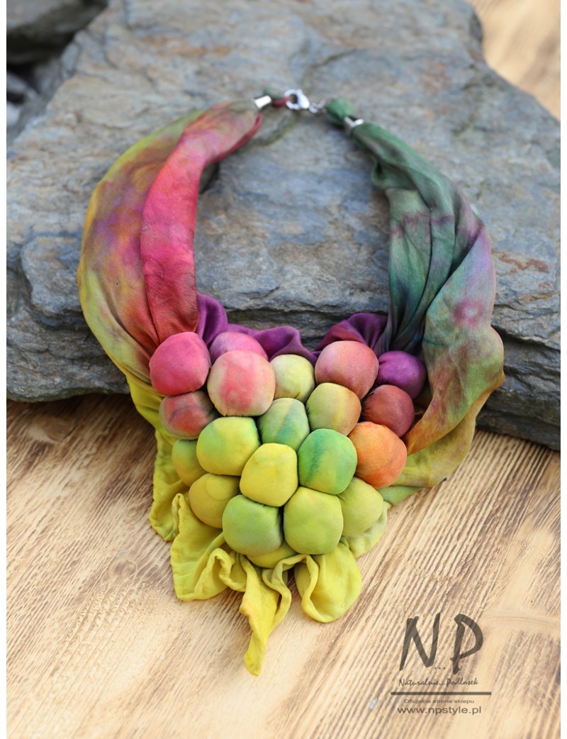 A short, hand-dyed necklace, made of natural silk