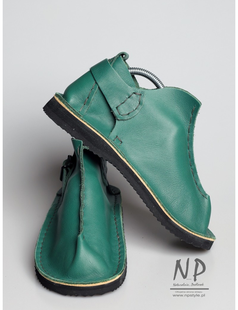 Green shoes handmade from natural Vagabond leather, sewn in the Trek workshop