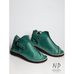 Green shoes handmade from natural Vagabond leather, sewn in the Trek workshop