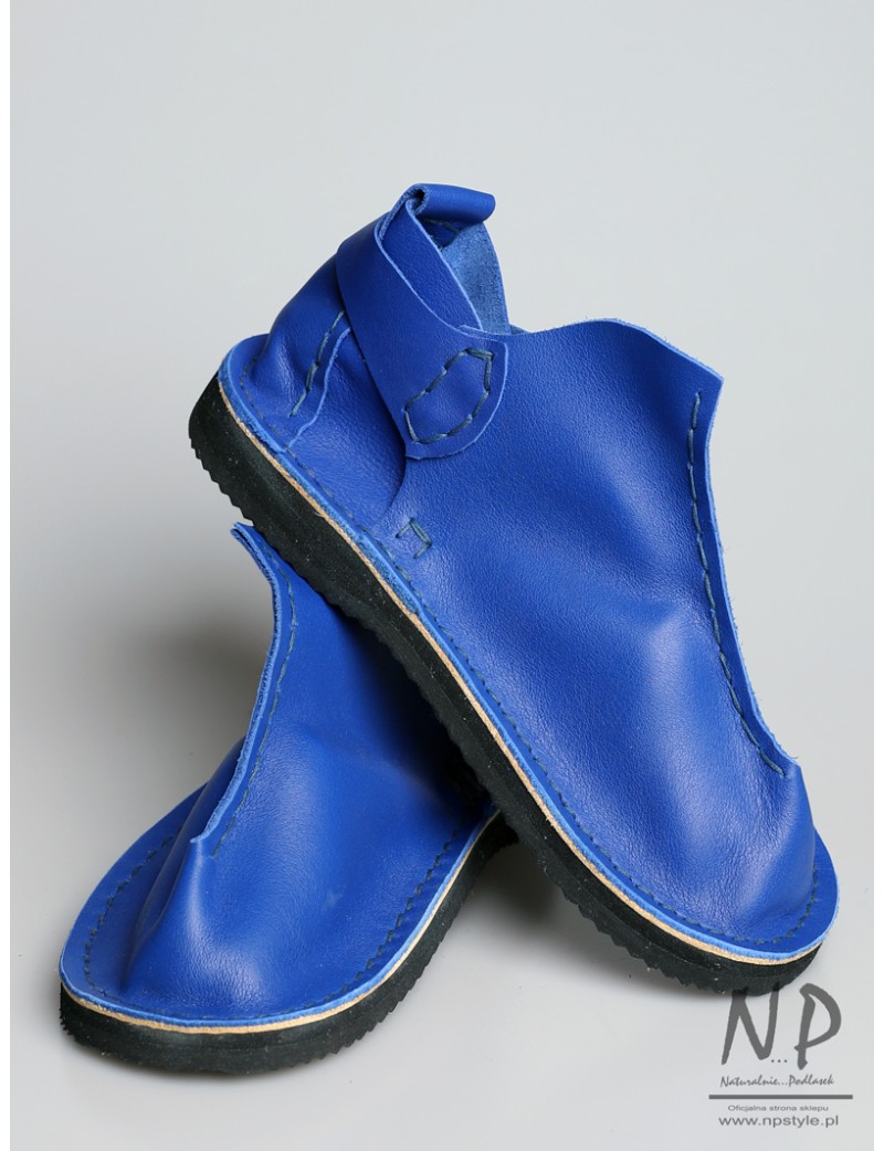 Handmade blue Vagabond shoes, made in the Trek workshop