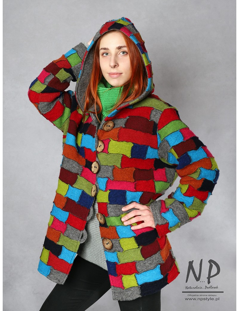 Colorful woolen jacket with a hood sewn in the form of a patchwork