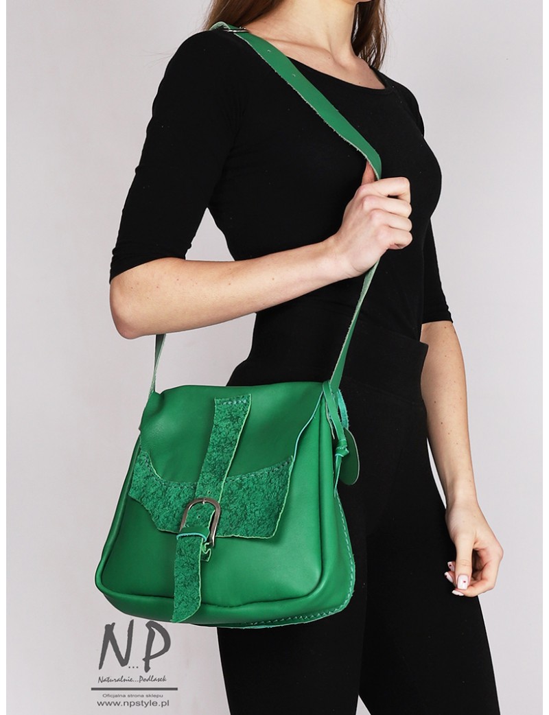 A medium-sized green handbag made of natural leather handmade
