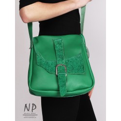 A medium-sized green handbag made of natural leather handmade