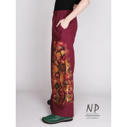 Ręcznie malowane lniane spodnie damskie z szerokimi nogawkami, typu szwedy