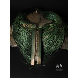 Handmade green necklace, made of linen and strings, decorated with ceramics