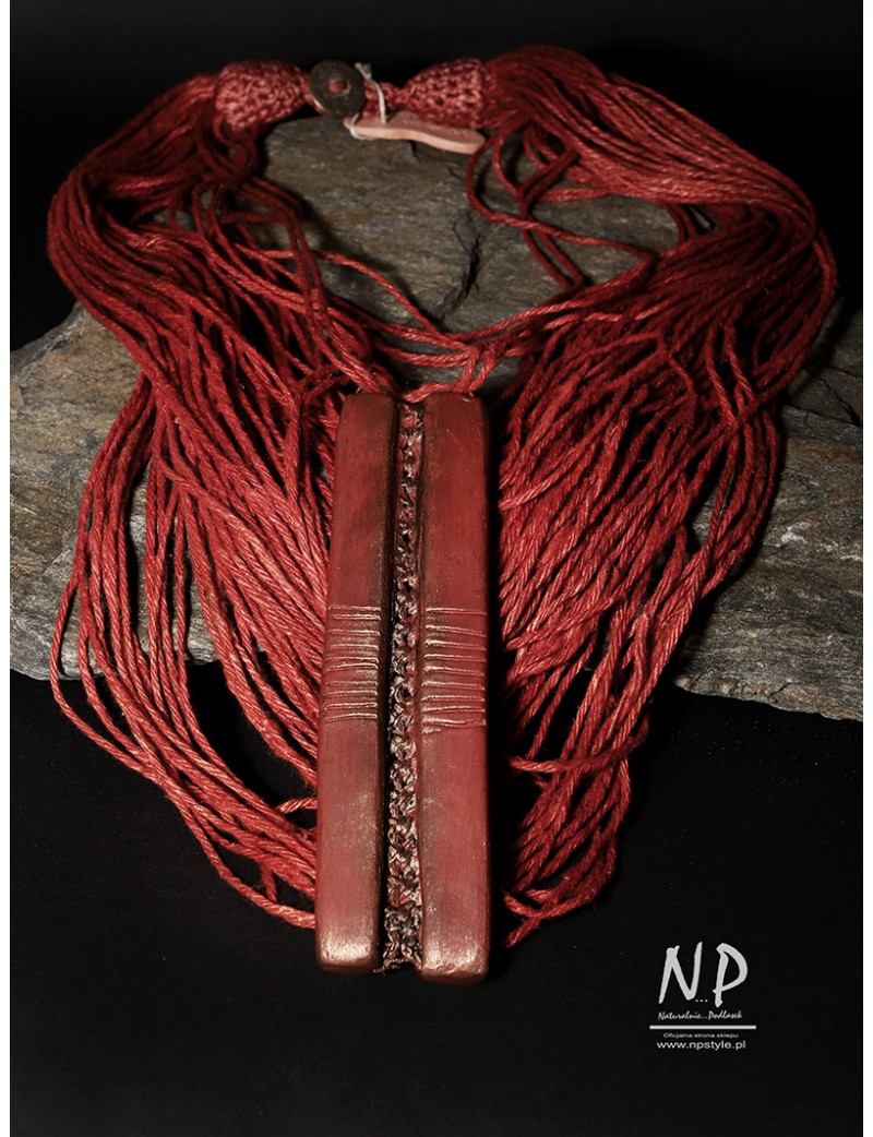 Handmade red necklace, made of linen and strings, decorated with ceramics