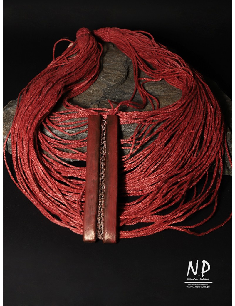 Handmade red necklace, made of linen and strings, decorated with ceramics