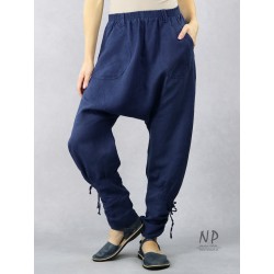 Navy blue linen trousers with a dropped crotch and tapered legs