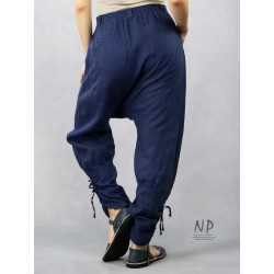 Navy blue linen trousers with a dropped crotch and tapered legs