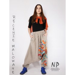 Linen trousers with a dropped crotch decorated with hand-painted patterns