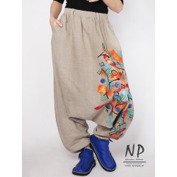 Linen trousers with a dropped crotch decorated with hand-painted patterns