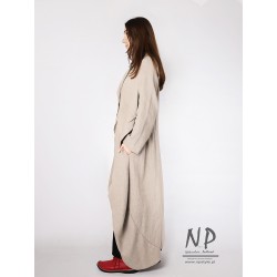 Women's long linen jacket coat sewn in a loose avant-garde style