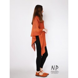 Lniane damskie ponczo sweterkowe zrobione ręcznie w kolorze pomarańczowym.