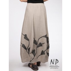 Linen bauble skirt with sewn-on flowers, finished with a belt on an elastic band