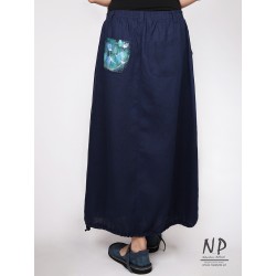 Linen bauble skirt decorated with hand-painted patterns, finished with a belt on an elastic band