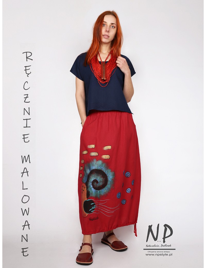 Red linen skirt decorated with hand-painted patterns, finished with a belt on an elastic band