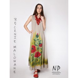 A long linen dress with straps decorated with hand-painted poppies