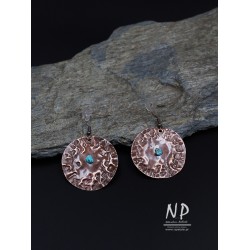 Handmade forged copper earrings decorated with turquoise