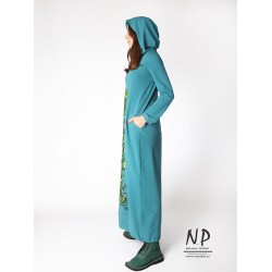 Turquoise knitted dress with a hood and turtleneck and hand-painted appliques