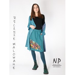 Knitted knee-length skirt decorated with hand-painted patterns
