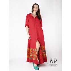 Hand-painted red linen maxi dress with a hood, buttoned up to the waist, with elbow-length sleeves and a front slit.