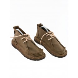 Brown moccasin shoes, sewn by hand.